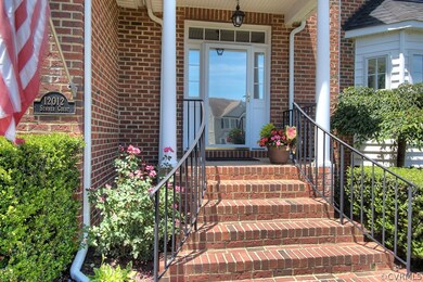 Impressive covered front entry.