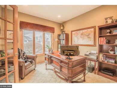 Office features elegant French doors.