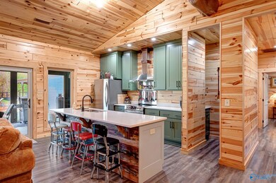Kitchen with custom cabinetry and 9 foot quartz kitchen island