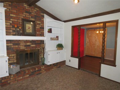 Living room with view of dining room.