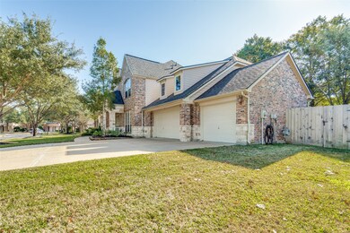 This home has a 3-car garage and a wide driveway for additional parking