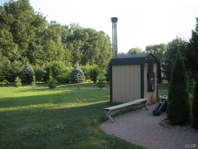 Wood burning furnace to heat in floor radiant heat