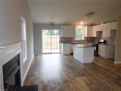 Looking into the Dining Room / Kitchen.