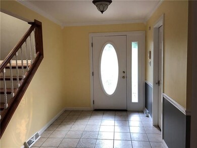 Foyer with ceramic flooring