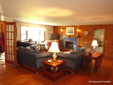 Sizable & open Living room with working wood burning fireplace.