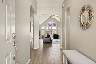 Sleek entry with large archways