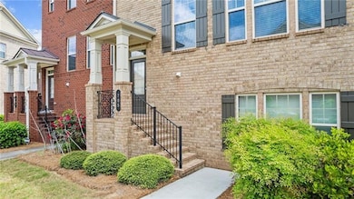 Entrance to property with brick siding
