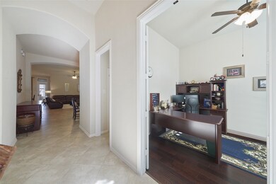 As you enter the Foyer the study is on the right, with French doors and wood floors.