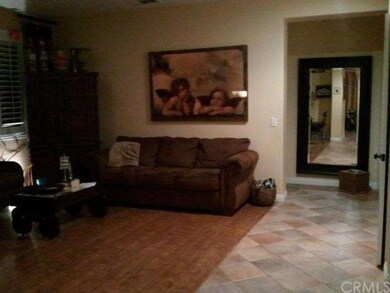 Formal living opens to formal dining room 