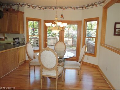 Eat in kitchen area with french door leading to ba