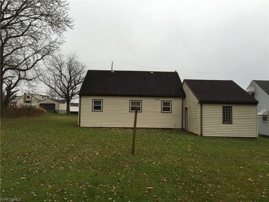 Back of home, nice size flat lot with side entranc