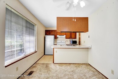 3928 Hunters Ridge Dr unit 1, Lansing, MI 48911 - photo 3