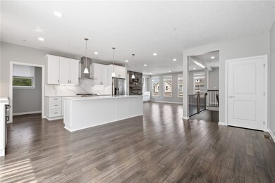 Dining area toward kitchen and family room.
