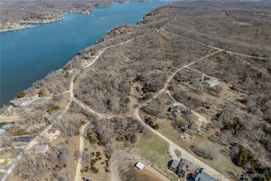 High up view of whole 20 acres surrounded by road