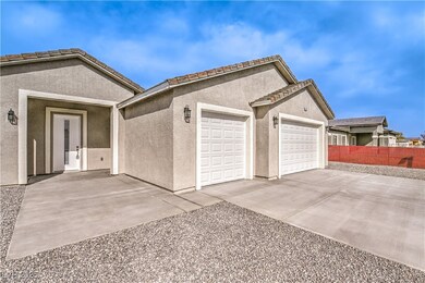 Garage with driveway and fence