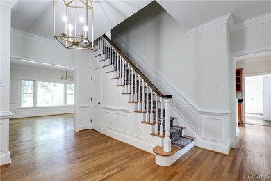 Beautiful hardwood floors greet you as you enter the elegant foyer.