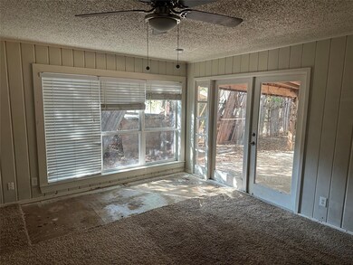 Just off the kitchen and opens up to the backyard