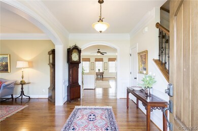 View of foyer, showing arched doorways and heavy c