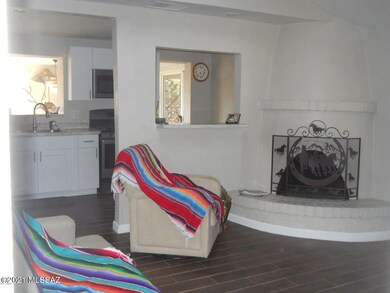 Living Room w Fireplace and bar
