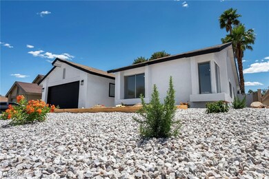 View of front of property with stucco siding and a