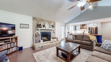 Great room area. REAL wood fire place. Shiplap wal