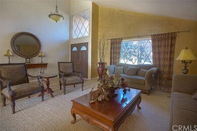 Living Room adjacent to entry way