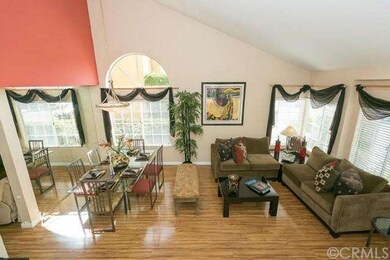 Looking from the stairway down to the living room