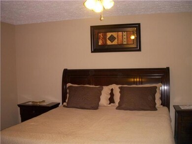 Large Master bedroom has all new paint and beautiful new laminate flooring has large master bath with new floor covering and ex-large walk in closet.