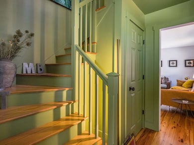 The front stairs, one of two in the house greets you as you enter