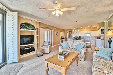 Living area with visible vents, light wood-type fl