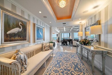 Inviting foyer only hints at the quality finishings so evident throughout this remarkable property.