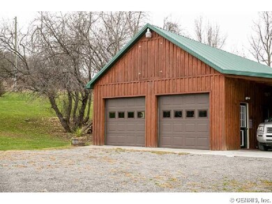 Outbuilding 2nd Garage here with a lot of extra sp