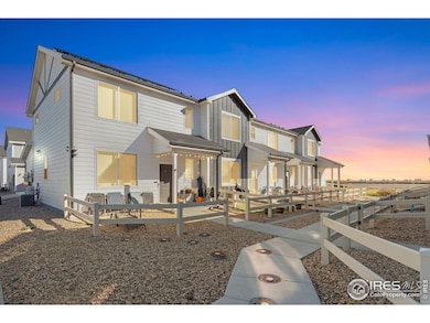 Full fenced front patio with artificial turf and play aera!