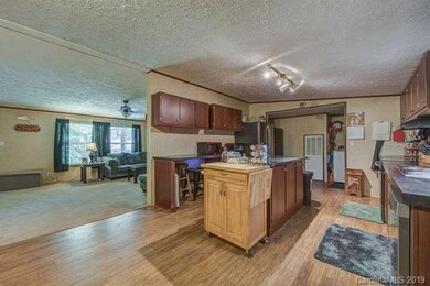 Kitchen looking into living rooom