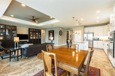 Dining space featuring a tray ceiling and ceiling 