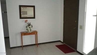 Inside entry-- light tile