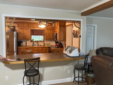 2) Living room (3) Looking into kitchen