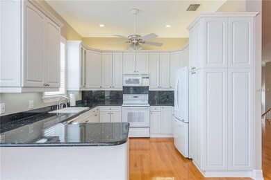 Beautiful light & bright kitchen with loads of cab