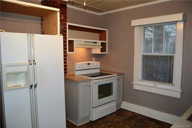 Kitchen with elec oven/range, dishwasher, refrigerator