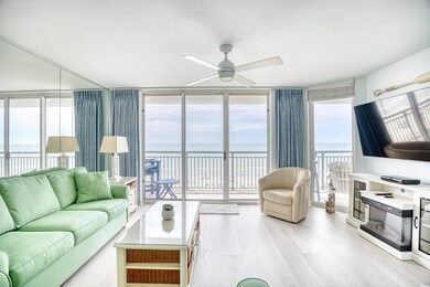 Living room featuring plenty of natural light, cei