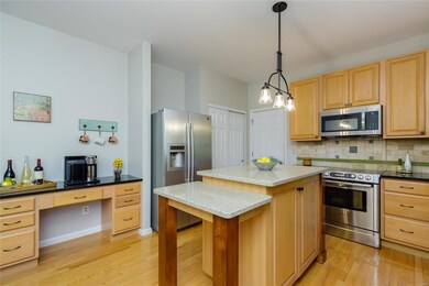 Kitchen with Center Island and Granite Countertops