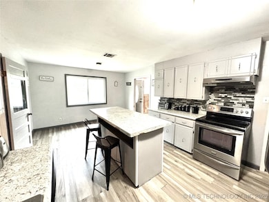 110 NW 3rd St, Checotah, OK 74426 - photo 3