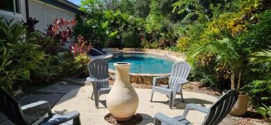Gathering area with pool in back