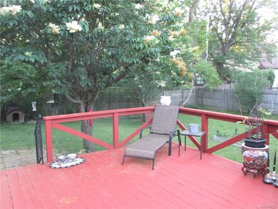 Door off Family Room to lrg deck & fully fenced in