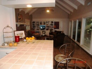KITCHEN LOOKING INTO FAMILY ROOM