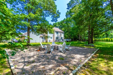 Back angle of house with firepit area