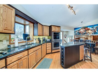 This custom kitchen has granite countertops, high 