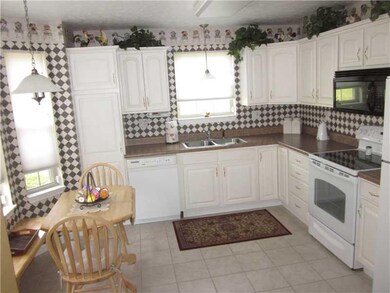 Kitchen. next to the entry area makes this one bet