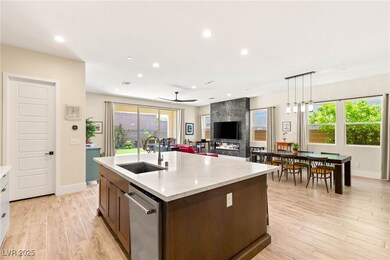 Kitchen featuring a sink, light wood-style floors,