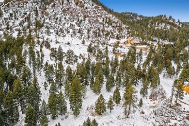 Snowy aerial view featuring a mountain view